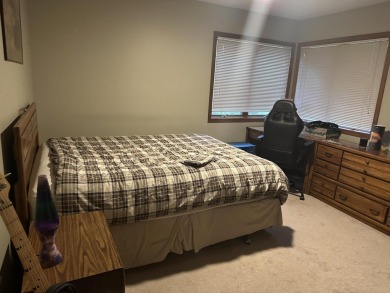 Enjoy golf course living in this comfortable 3 bed, 3 bath home on Michaywe Pines Course in Michigan - for sale on GolfHomes.com, golf home, golf lot
