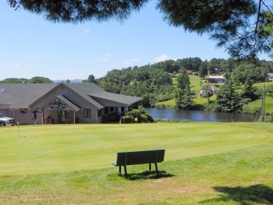 Welcome to a move-in ready charming cabin that is tucked into on Skyland Lakes Golf Course in Virginia - for sale on GolfHomes.com, golf home, golf lot