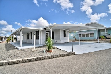 BEAUTIFUL FLORIDA OASIS located in a 55+ GATED community in the on Southern Dunes Golf and Country Club in Florida - for sale on GolfHomes.com, golf home, golf lot