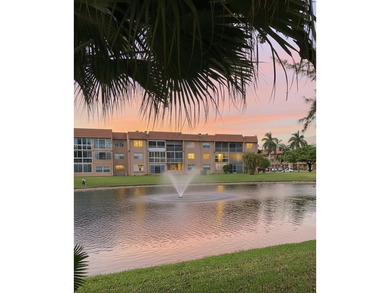 Enjoy peaceful 55+ living in this well-kept 2-bed, 2-bath condo on Sunrise Lakes Phase IV Golf Course in Florida - for sale on GolfHomes.com, golf home, golf lot