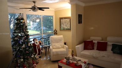Enjoy peaceful 55+ living in this well-kept 2-bed, 2-bath condo on Sunrise Lakes Phase IV Golf Course in Florida - for sale on GolfHomes.com, golf home, golf lot