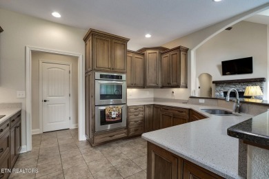 Welcome to 102 Vinita Way! This exceptional golf-front residence on Tanasi Golf Course in Tennessee - for sale on GolfHomes.com, golf home, golf lot