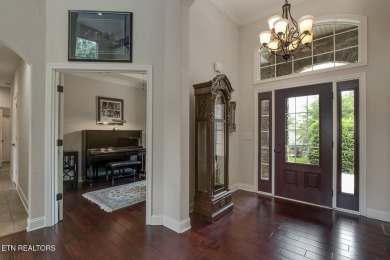 Welcome to 102 Vinita Way! This exceptional golf-front residence on Tanasi Golf Course in Tennessee - for sale on GolfHomes.com, golf home, golf lot
