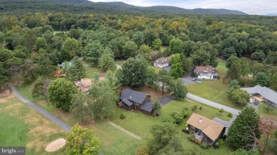 A Masterpiece of Modern Elegance on the Fairway! Experience the on The Woods  Golf and Resort in West Virginia - for sale on GolfHomes.com, golf home, golf lot