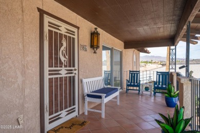Wake up to peaceful lake views and vibrant sunsets at 565 Jones on London Bridge Golf Course in Arizona - for sale on GolfHomes.com, golf home, golf lot