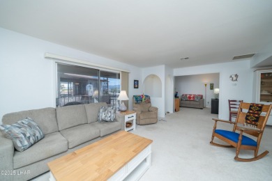 Wake up to peaceful lake views and vibrant sunsets at 565 Jones on London Bridge Golf Course in Arizona - for sale on GolfHomes.com, golf home, golf lot