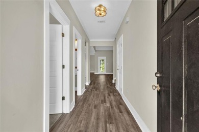 Stunning 5-bedroom, 4-bath home built by Tony Butler on Canongate At Healy Point Country Club in Georgia - for sale on GolfHomes.com, golf home, golf lot