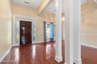 Experience coastal living in this charming 3-bedroom, 2-bath on Members Club At St. James Plantation in North Carolina - for sale on GolfHomes.com, golf home, golf lot