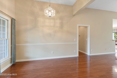 Experience coastal living in this charming 3-bedroom, 2-bath on Members Club At St. James Plantation in North Carolina - for sale on GolfHomes.com, golf home, golf lot