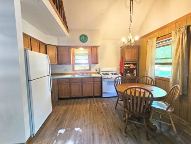 This charming 3-bedroom, 1-bath chalet-style home offers a on Birch Pointe Golf Club in Michigan - for sale on GolfHomes.com, golf home, golf lot