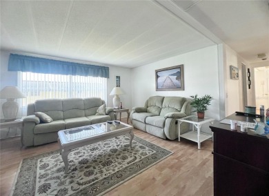 Welcome to this lovingly maintained and fully furnished on Fairway Village Golf Course in Florida - for sale on GolfHomes.com, golf home, golf lot