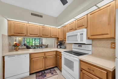 Highly elevated condo in picturesque Isla Del Sol , St on Isla Del Sol Yacht and Country Club in Florida - for sale on GolfHomes.com, golf home, golf lot