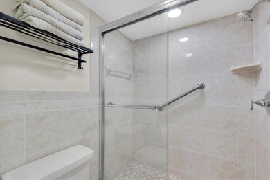 Highly elevated condo in picturesque Isla Del Sol , St on Isla Del Sol Yacht and Country Club in Florida - for sale on GolfHomes.com, golf home, golf lot