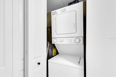 Highly elevated condo in picturesque Isla Del Sol , St on Isla Del Sol Yacht and Country Club in Florida - for sale on GolfHomes.com, golf home, golf lot