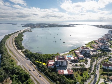 Highly elevated condo in picturesque Isla Del Sol , St on Isla Del Sol Yacht and Country Club in Florida - for sale on GolfHomes.com, golf home, golf lot
