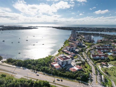 Highly elevated condo in picturesque Isla Del Sol , St on Isla Del Sol Yacht and Country Club in Florida - for sale on GolfHomes.com, golf home, golf lot