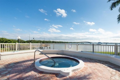 Highly elevated condo in picturesque Isla Del Sol , St on Isla Del Sol Yacht and Country Club in Florida - for sale on GolfHomes.com, golf home, golf lot
