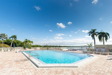 Highly elevated condo in picturesque Isla Del Sol , St on Isla Del Sol Yacht and Country Club in Florida - for sale on GolfHomes.com, golf home, golf lot