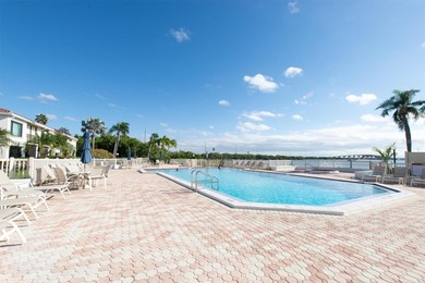 Highly elevated condo in picturesque Isla Del Sol , St on Isla Del Sol Yacht and Country Club in Florida - for sale on GolfHomes.com, golf home, golf lot