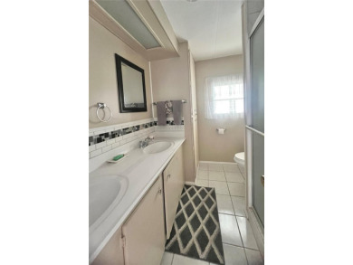 Welcome to this lovingly maintained and fully furnished on Fairway Village Golf Course in Florida - for sale on GolfHomes.com, golf home, golf lot