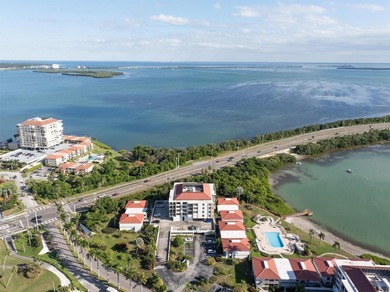 Highly elevated condo in picturesque Isla Del Sol , St on Isla Del Sol Yacht and Country Club in Florida - for sale on GolfHomes.com, golf home, golf lot