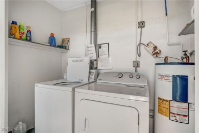 **RECENTLY REDUCED!!**  Welcome to this charming condo with on Cypress Lake Country Club in Florida - for sale on GolfHomes.com, golf home, golf lot