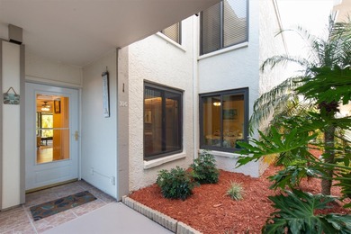 Highly elevated condo in picturesque Isla Del Sol , St on Isla Del Sol Yacht and Country Club in Florida - for sale on GolfHomes.com, golf home, golf lot