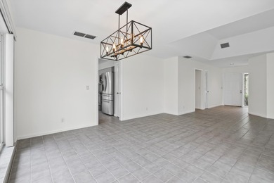 New price on this golf course 3-bedroom! Priced below comparable on Monarch Country Club in Florida - for sale on GolfHomes.com, golf home, golf lot