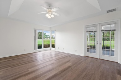 New price on this golf course 3-bedroom! Priced below comparable on Monarch Country Club in Florida - for sale on GolfHomes.com, golf home, golf lot