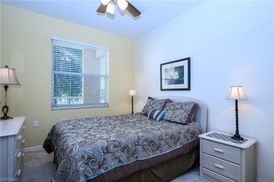 Panoramic lake and fairway views abound in this elegant on Cedar Hammock Golf and Country Club in Florida - for sale on GolfHomes.com, golf home, golf lot