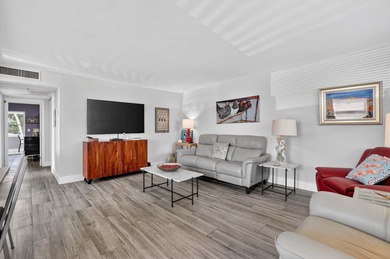 Well-planned, thoughtful renovations have created an open on Kings Point Golf -Flanders Way in Florida - for sale on GolfHomes.com, golf home, golf lot