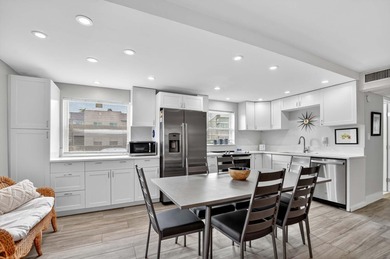 Well-planned, thoughtful renovations have created an open on Kings Point Golf -Flanders Way in Florida - for sale on GolfHomes.com, golf home, golf lot