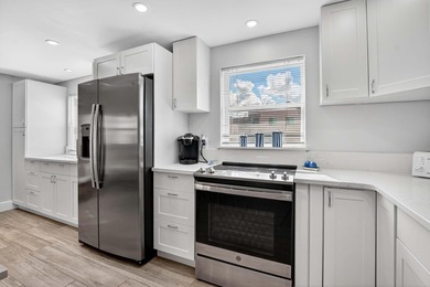 Well-planned, thoughtful renovations have created an open on Kings Point Golf -Flanders Way in Florida - for sale on GolfHomes.com, golf home, golf lot