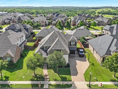Welcome to this stunning 4-bed, 3.5-bath home with a spacious on Trophy Club of Dallas in Texas - for sale on GolfHomes.com, golf home, golf lot