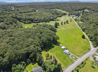 Discover the potential of this 3-bedroom, 1-bath ranch-style on Indian Mountain Golf Course in Pennsylvania - for sale on GolfHomes.com, golf home, golf lot