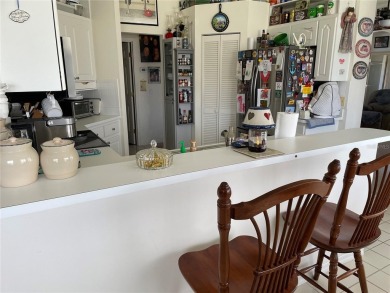 This charming 2-bedroom, 2-bath home is situated in the on Twisted Oaks Golf Club in Florida - for sale on GolfHomes.com, golf home, golf lot