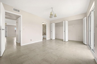 SECOND FLOOR CORNER UNIT WITH GARDEN VIEW ,FRESH PAINTED IN on Kings Point Golf - Executive in Florida - for sale on GolfHomes.com, golf home, golf lot