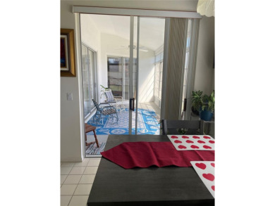 This charming 2-bedroom, 2-bath home is situated in the on Twisted Oaks Golf Club in Florida - for sale on GolfHomes.com, golf home, golf lot
