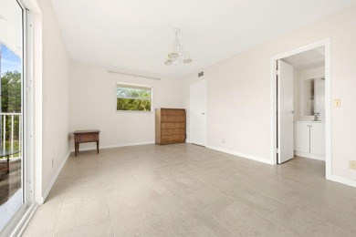 SECOND FLOOR CORNER UNIT WITH GARDEN VIEW ,FRESH PAINTED IN on Kings Point Golf - Executive in Florida - for sale on GolfHomes.com, golf home, golf lot