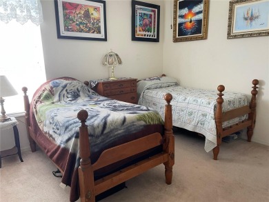 This charming 2-bedroom, 2-bath home is situated in the on Twisted Oaks Golf Club in Florida - for sale on GolfHomes.com, golf home, golf lot