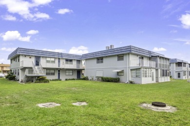 SECOND FLOOR CORNER UNIT WITH GARDEN VIEW ,FRESH PAINTED IN on Kings Point Golf - Executive in Florida - for sale on GolfHomes.com, golf home, golf lot
