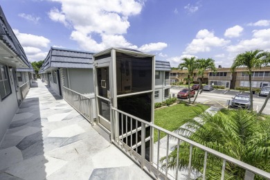 SECOND FLOOR CORNER UNIT WITH GARDEN VIEW ,FRESH PAINTED IN on Kings Point Golf - Executive in Florida - for sale on GolfHomes.com, golf home, golf lot