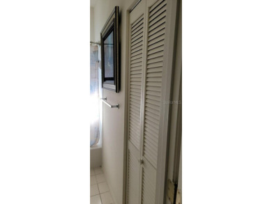 This charming 2-bedroom, 2-bath home is situated in the on Twisted Oaks Golf Club in Florida - for sale on GolfHomes.com, golf home, golf lot