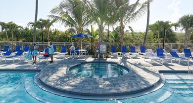 This beautifully maintained 1-bedroom, 1-bath residence offers on Ocean Village Golf Course in Florida - for sale on GolfHomes.com, golf home, golf lot