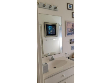 This charming 2-bedroom, 2-bath home is situated in the on Twisted Oaks Golf Club in Florida - for sale on GolfHomes.com, golf home, golf lot