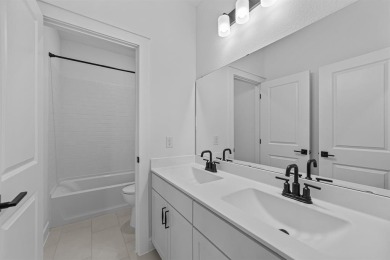 Fabulous two-story home located at Heath Golf and Yacht Club in on Heath Golf and Yacht Club in Texas - for sale on GolfHomes.com, golf home, golf lot