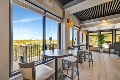 This beautifully maintained 1-bedroom, 1-bath residence offers on Ocean Village Golf Course in Florida - for sale on GolfHomes.com, golf home, golf lot