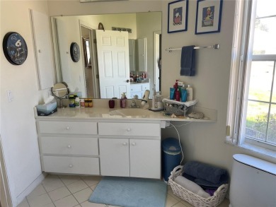 This charming 2-bedroom, 2-bath home is situated in the on Twisted Oaks Golf Club in Florida - for sale on GolfHomes.com, golf home, golf lot