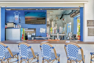 This beautifully maintained 1-bedroom, 1-bath residence offers on Ocean Village Golf Course in Florida - for sale on GolfHomes.com, golf home, golf lot