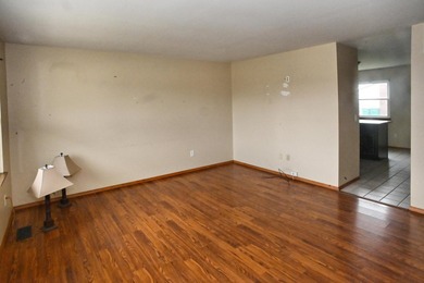 Welcome to this charming ranch home in Lakes of the Four Seasons on Lakes of the Four Seasons Country Club in Indiana - for sale on GolfHomes.com, golf home, golf lot